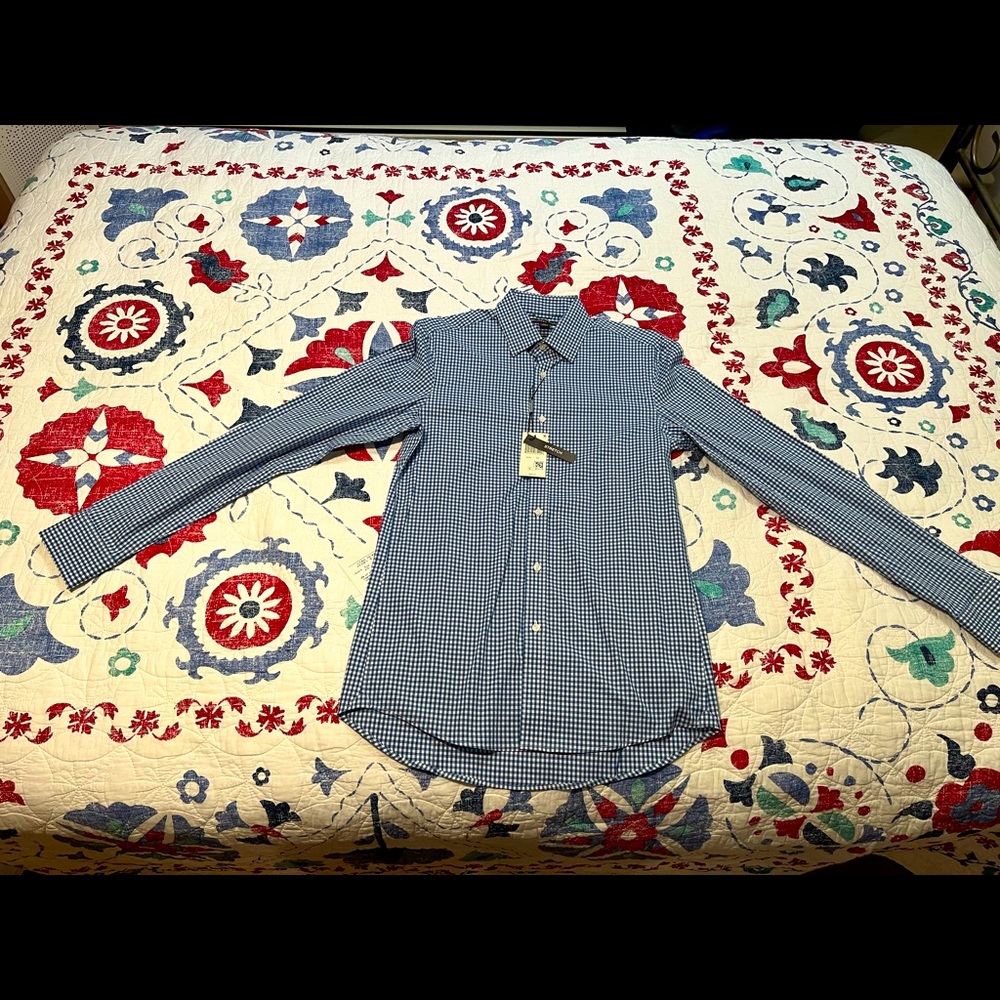 Michael Kors dress shirt. Brand new and never worn with tags. Size xs.